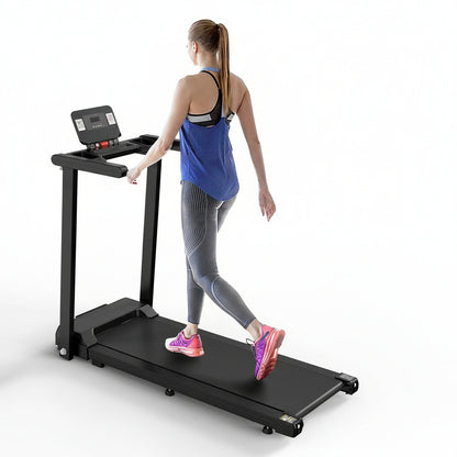 Woman using a treadmill on a white background