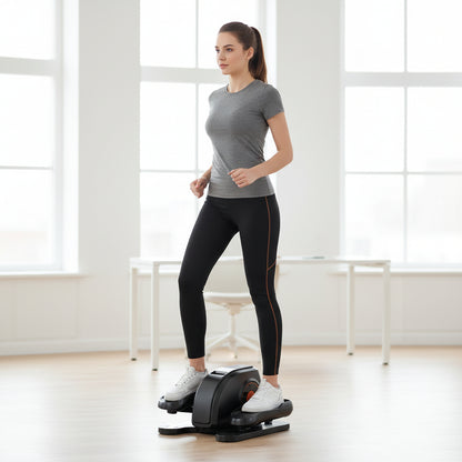 Black and gray eleptical machine with dimensions on a white background